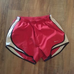 red nike shorts
