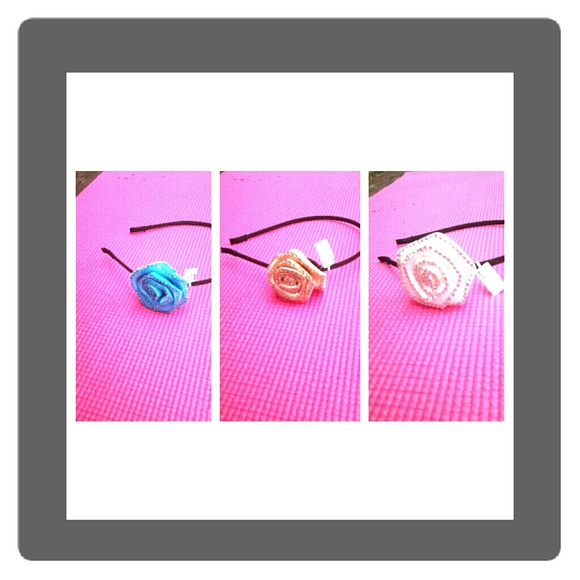 Blue,gold,white rhinestone rose heads bands.