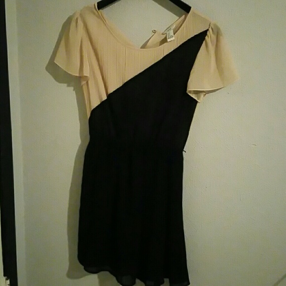 Tan and black flirty dress