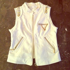 White leather vest with gold fixings