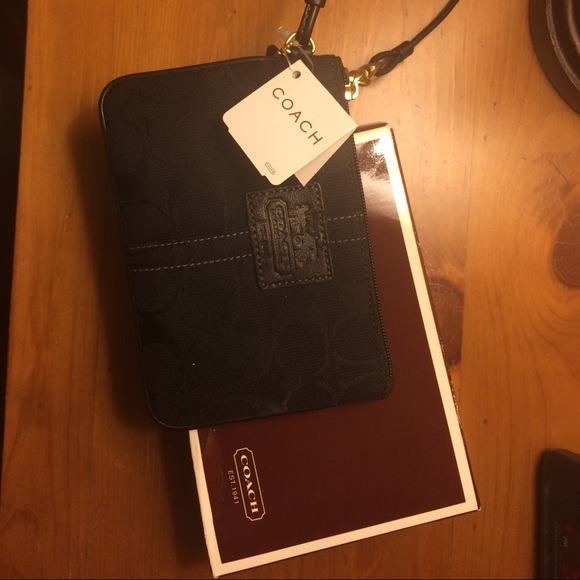Brand new COACH wristlet