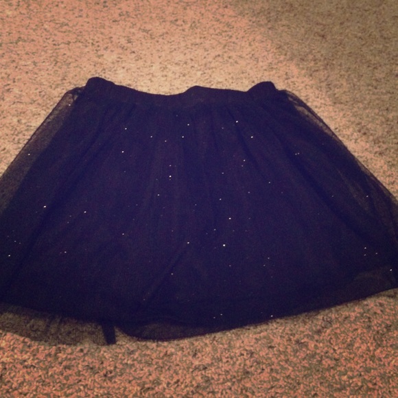 Black sparkly skirt.