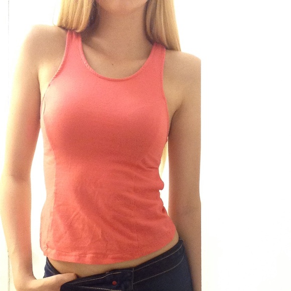 Bright pink/ coral racer back tank with cutouts