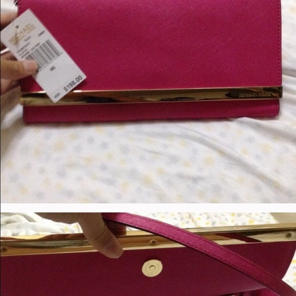 Michael kors fuchsia clutch