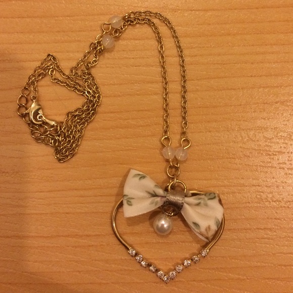 Heart bow tie necklace