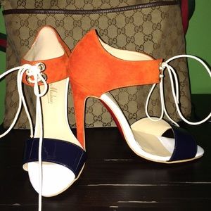 Orange, navy blue, and white shoes