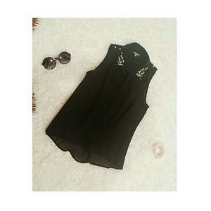 Black top with pearl beading