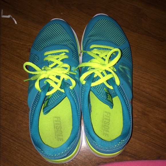 Teal and yellow Nike flex running shoes