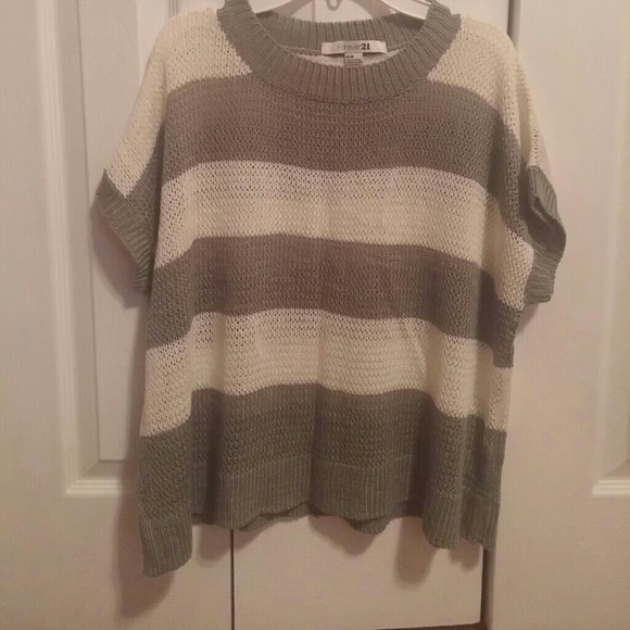 Green and white knit sweater