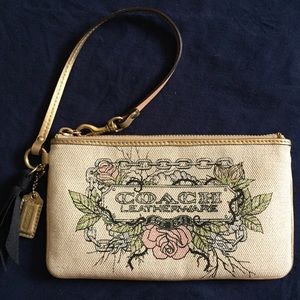 Coach tattoo print wristlet