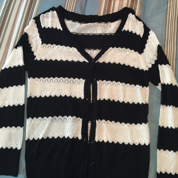 Black and white striped button up sweater.
