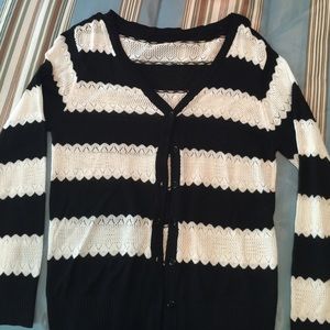 Black and white striped button up sweater.