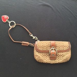 Coach Wristlet with heart charm