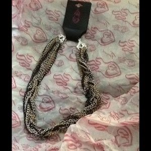 Torrid Twist Necklace With Black, Gold, Sliver.