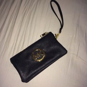Black and gold wristlet