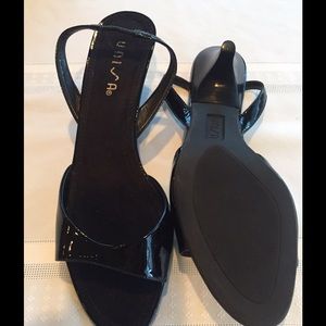 Unisa Sling back black patent sandal