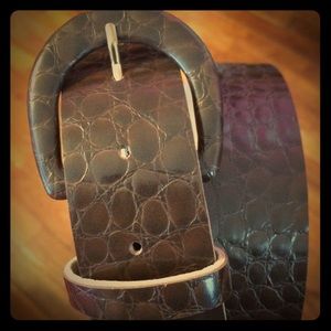 Dark brown, sturdy, textured belt.