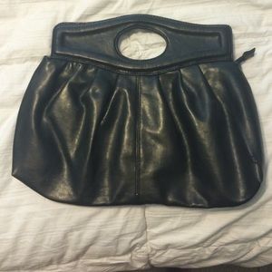 Black clutch with handle. Only used once