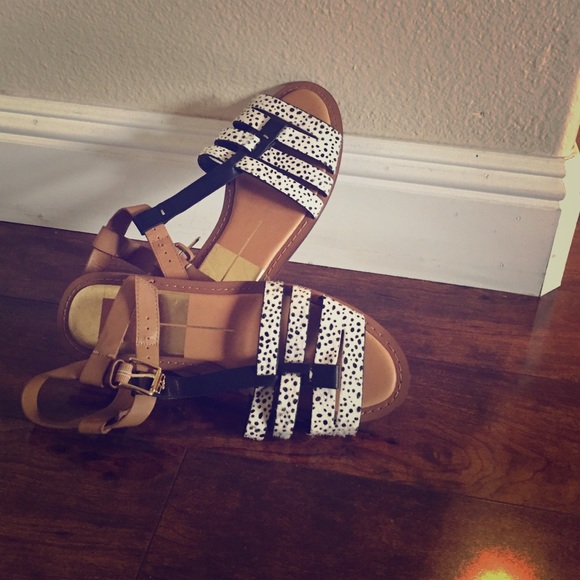 Flat sandals caramel , black and white not worn .