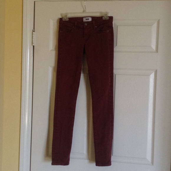 Paige brick colored denim skinny jeans.