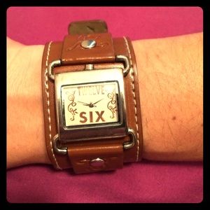 Brown thick strapped watch