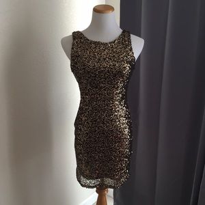 Sexy gold sequence form fitting backless dress!
