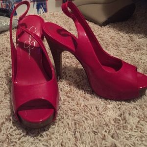 Red peep toe sling backs.