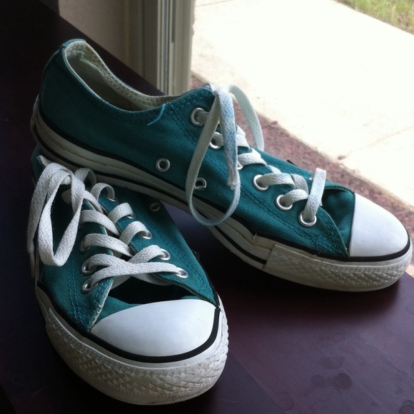 Teal Converse all stars