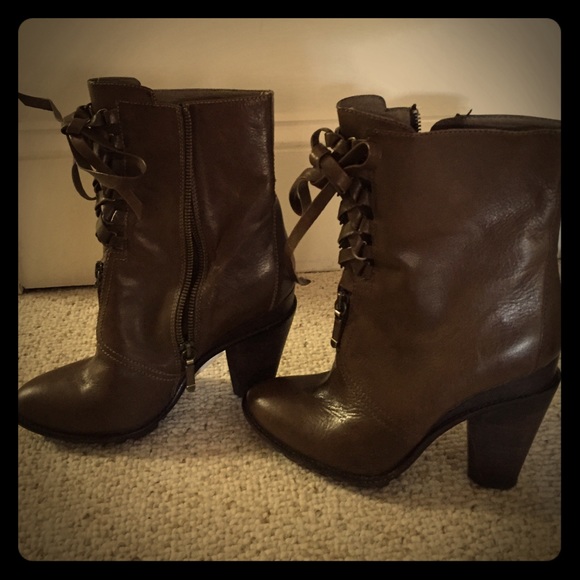 Donating soon NWT lace up heel boots