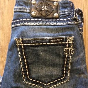 Miss Me boyfriend capri in a darker wash color.