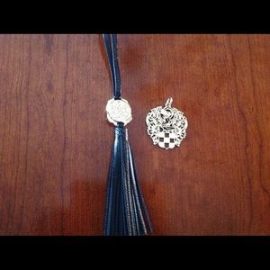 Two Vince Camuto hang tags