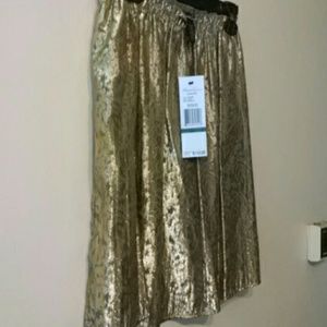 Gold glitteriish mettalic above the knee holidays