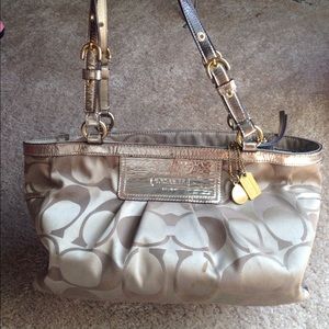 Rose gold coach hand bag