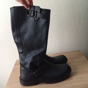 Black leather boots by Steve Madden