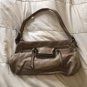 Beige purse with gun metal details
