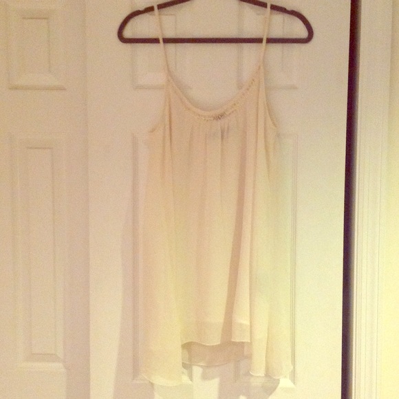 Semi sheer sleeveless tunic
