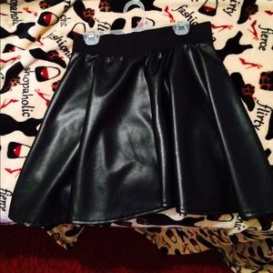 Pleather Flowy Skirt .