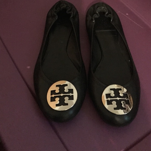 Black flats with silver buckle