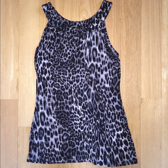 Leopard top with black studs on neck line.