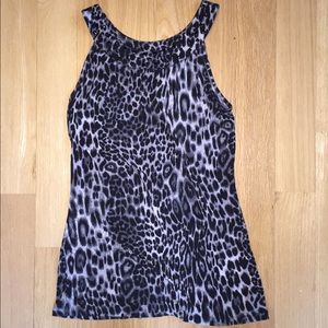 Leopard top with black studs on neck line.