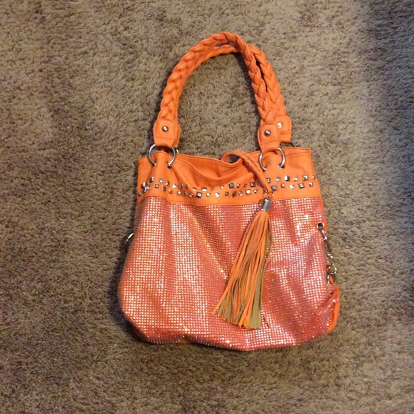 An orange rhinestone handbag from Bangles&Bags