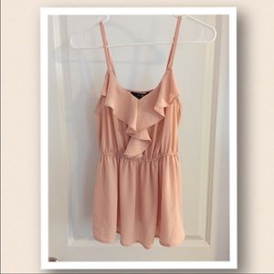 Peach ruffle top.
