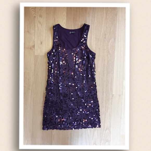 Purple sequin flapper style dress.