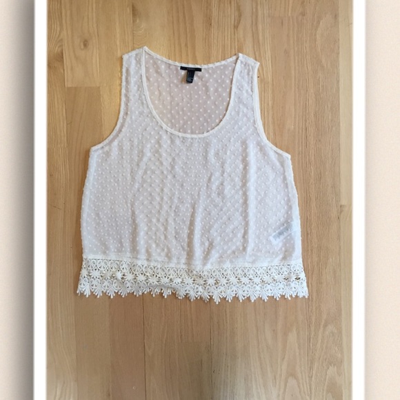 Off white top with lace detail.