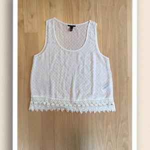 Off white top with lace detail.