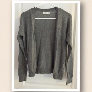 Gray open front cardigan.