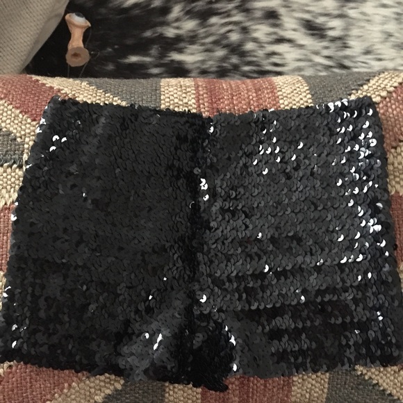 Black sequin shorts.
