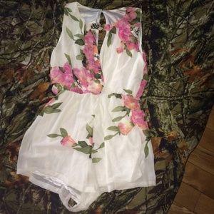 White floral shorts romper.