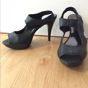 Vera Wang. Black cut-out platform heels.