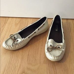 Cream leather Sperry with rope detail.